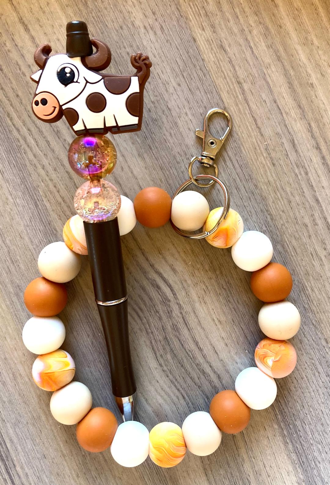 Beaded Fall Cow Wristlet And Pen Set