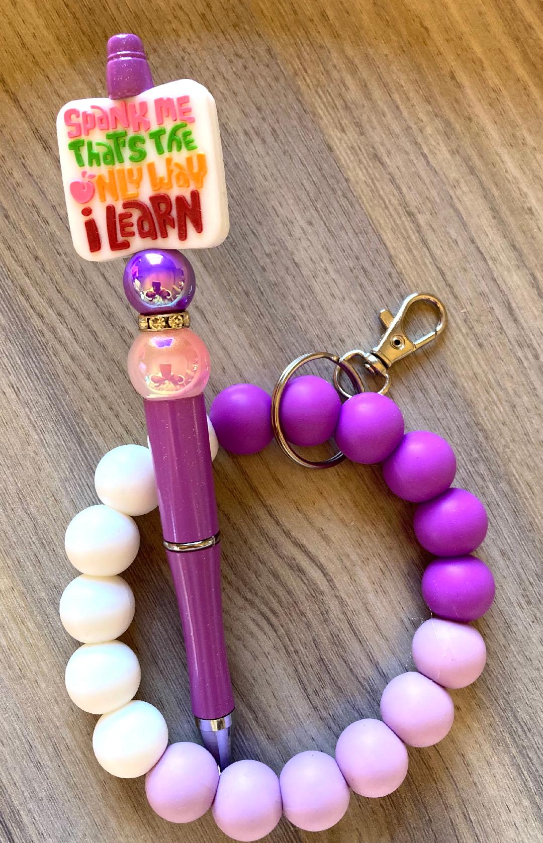 Beaded Spank Me Wristlet And Pen Set