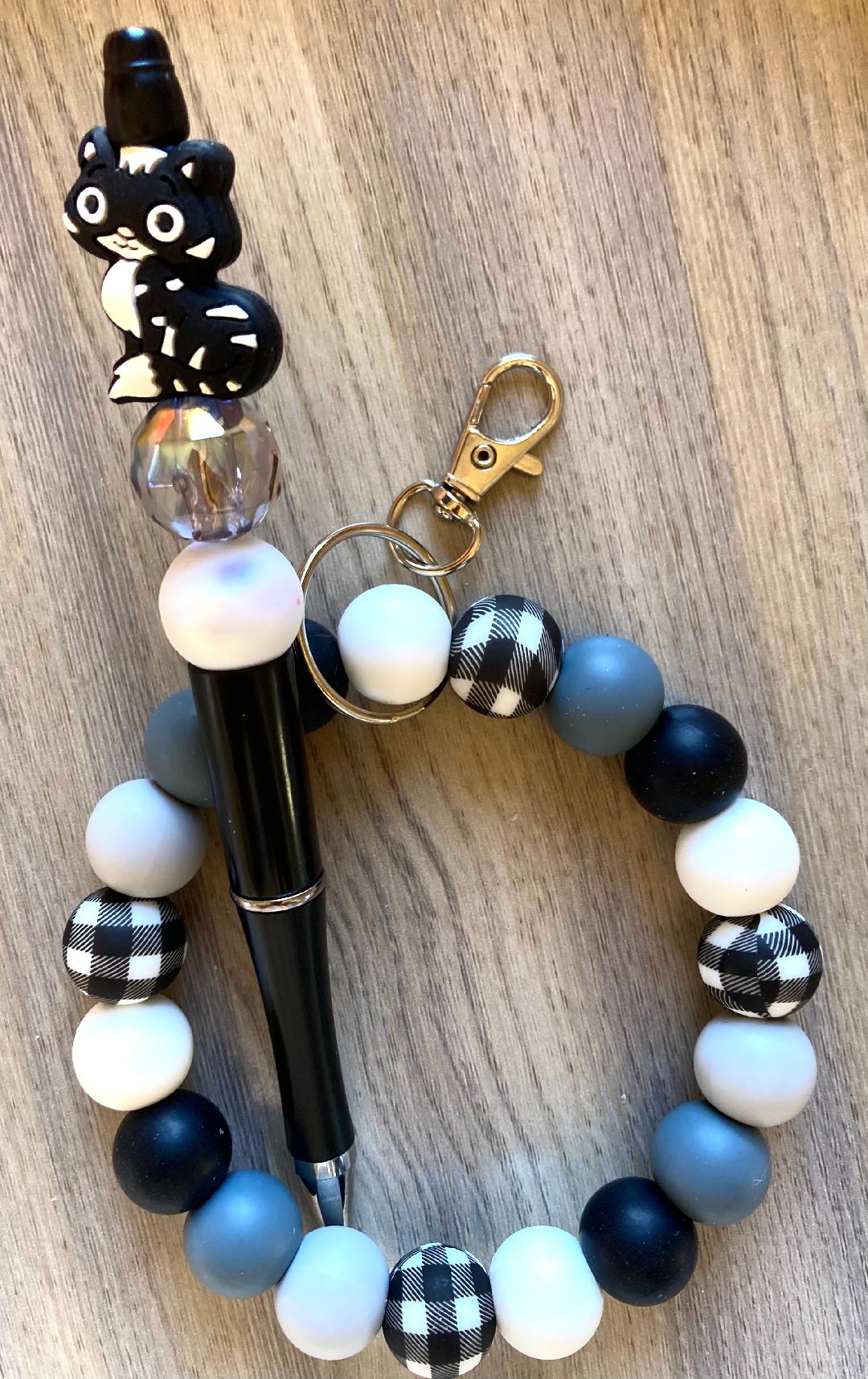 Beaded Black Cow Wristlet And Pen Set
