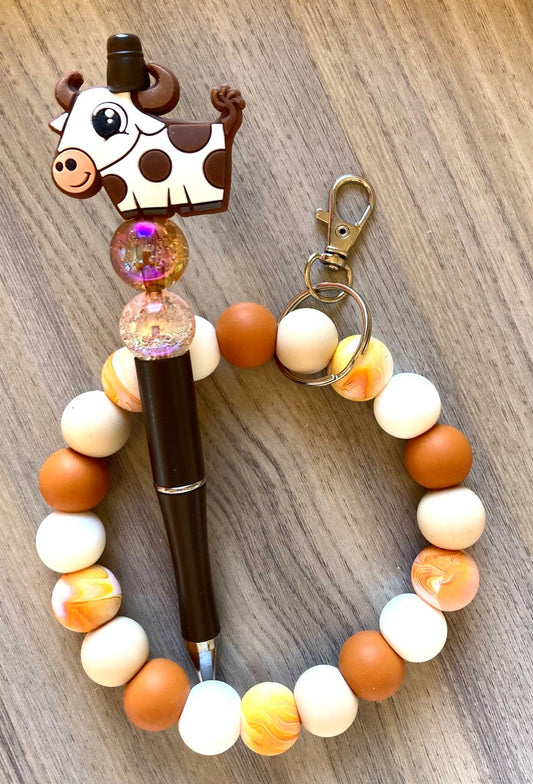Beaded Fall Cow Wristlet And Pen Set